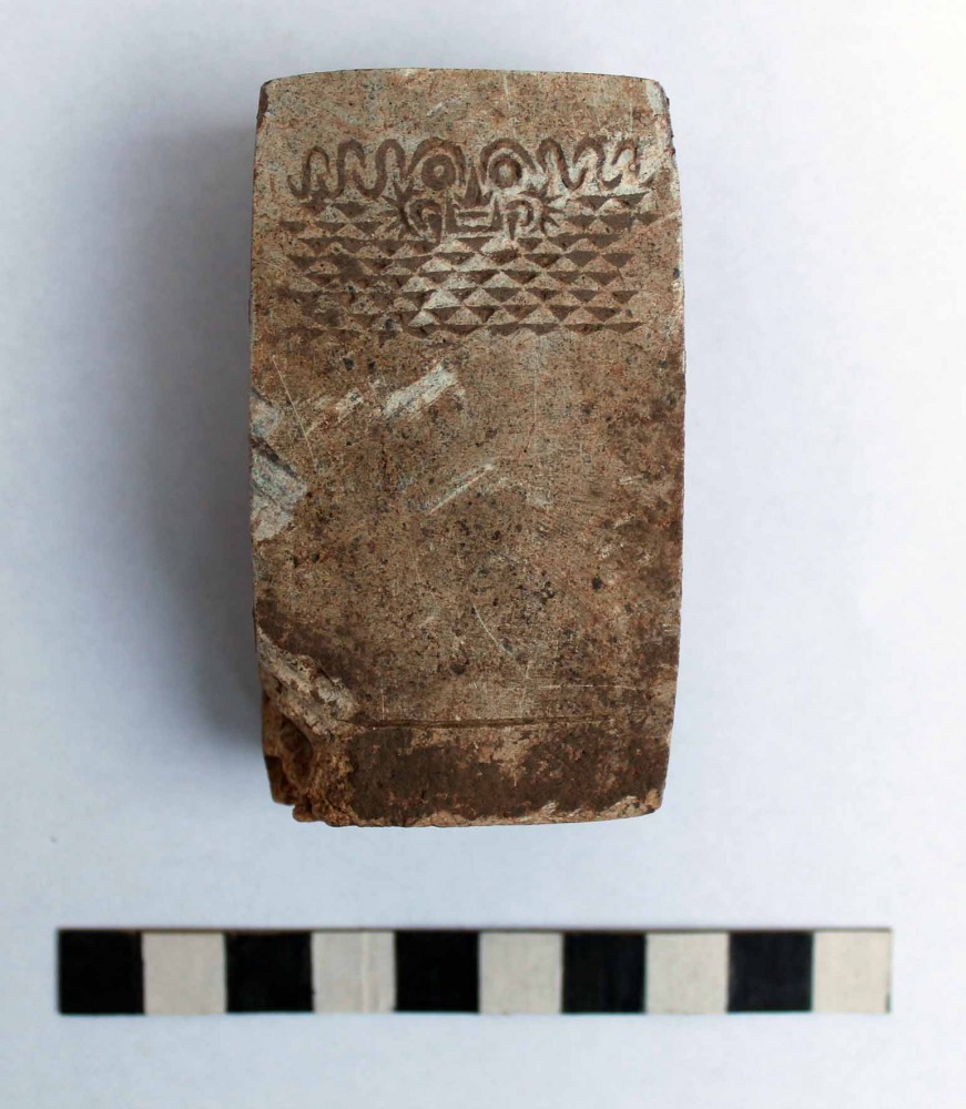 Fig. 2: A stone figurine excavated by our project from a Xinglongwa site